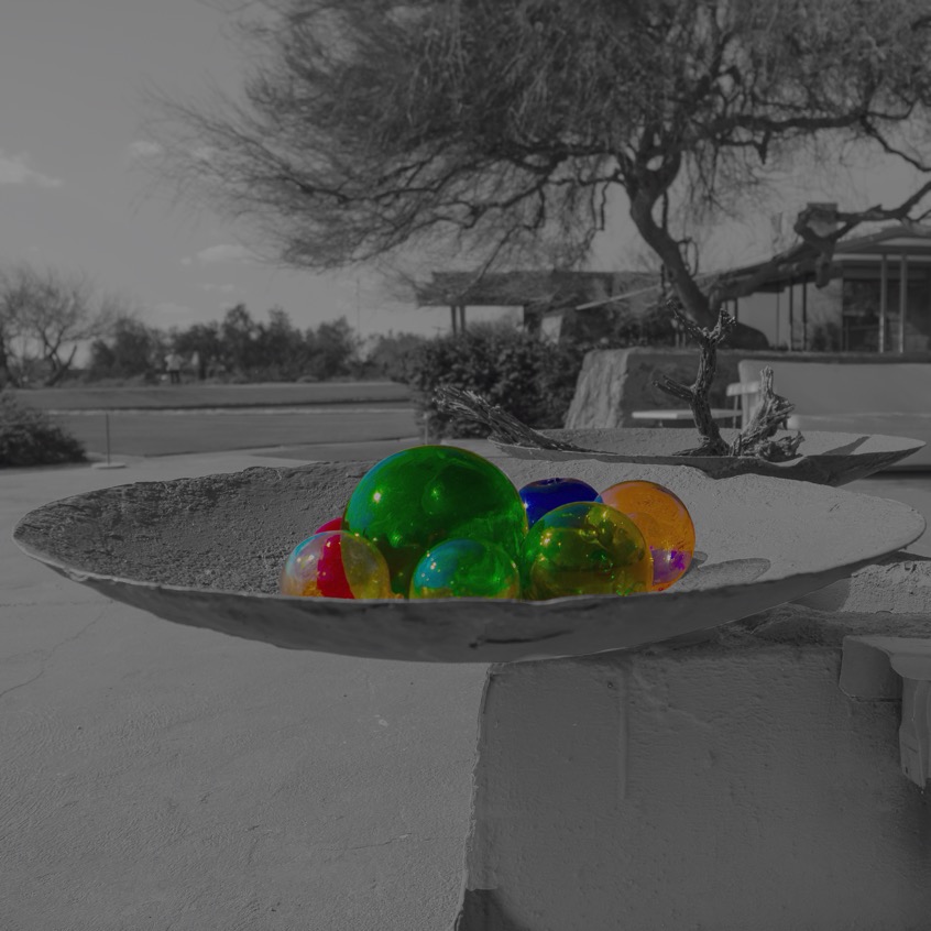 Glass spheres arranged on a platter at Taliesin West